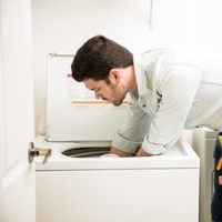 whirlpool washer out of balance when spinning