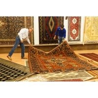 how to get a rug to lay flat on carpet 2022