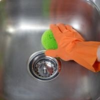 remove chemical stains from stainless steel sink