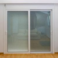 how to put a sliding screen door back on track