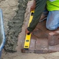 how to level ground for pavers