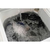 how to remove lint from black clothes in washing machine