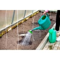 watering the garden beds